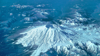 Mountain view tiltshift aerial ocean - a view of a mountain free wallpaper