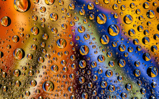 Water droplets rainbow background macro - abstract illusionism free wallpaper