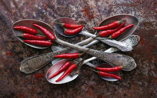 Spoons red peppers rusted tabletop - a table top free wallpaper