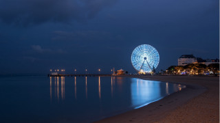 Ferris wheel beach night cityscape - a ferris wheel free wallpaper