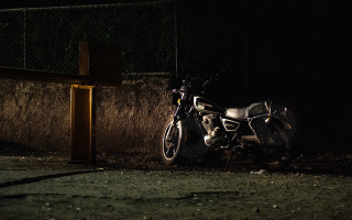 Motorcycle fence night cross road - a fence free wallpaper