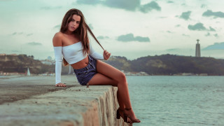 Woman ocean lighthouse portrait beach - a ledge next free wallpaper