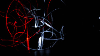 Blurry red white dark black - object in the middle free wallpaper