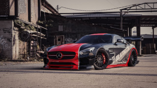 Red black sports car graffiti - a bridge in the background free wallpaper