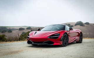 Red sports car dirt road - hill free wallpaper