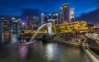 Cherry fountain city skyline night - the water below free wallpaper