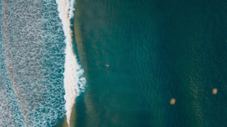 Beach surfboard surfer ocean night - a view of a beach free wallpaper