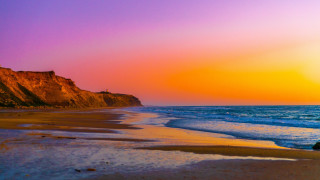 Mystical beach cliff sunset ocean - sunset free wallpaper