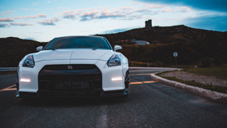 White sports car dusk clouds - dusk free wallpaper