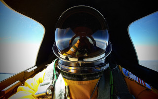 Space suit person ocean window - inside free wallpaper