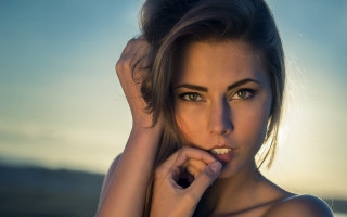 Woman white shirt bun hands - piercing free wallpaper