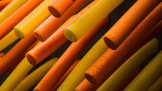 Orange yellow sticks store wall - carol bove free wallpaper