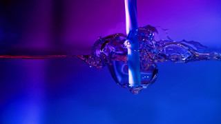 Purple blue liquid poured glass - a glass of water free wallpaper