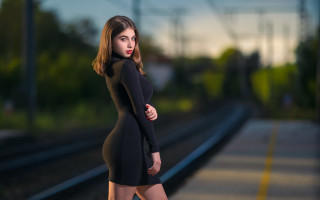 Woman black dress train track - her leg free wallpaper