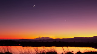 Sunset moon distant mountains lake - a lake in the foreground free wallpaper