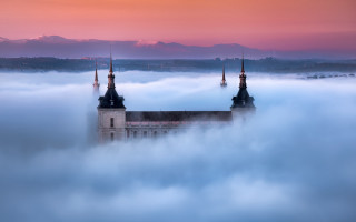 Castle foggy mountains pink sky - a pink sky free wallpaper