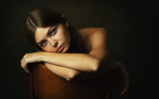 Woman crossed arms chair blue - her arm free wallpaper