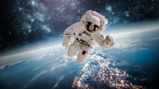 Astronaut space starry sky clouds - free space wallpaper
