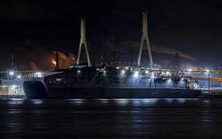 Large boat docked night city - night free wallpaper
