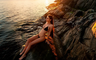 Woman bikini sitting rock ocean 2 - sunset free wallpaper