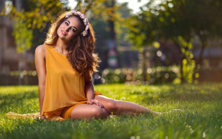 Woman sitting yellow dress smiling - a yellow dress free wallpaper