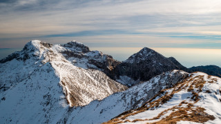 Mountain range snowy cloudy horizon - murata range free wallpaper