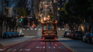Trolley night cityscape bridge lights - traffic free wallpaper