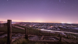 Mountain road city lights night - night sky free wallpaper