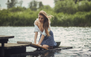 Woman dock water tree beach - the water behind her free wallpaper