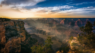 Canyon sunset clouds cliff person - a view of a canyon free wallpaper