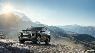Black suv mountain road landscape - a black suv free wallpaper