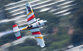 Small airplane flying trees blurry - cubofuturism free wallpaper