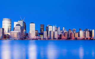 City skyline blue water architecture - a blue sky and water free wallpaper