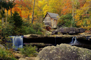 Small wooden cabin hillside waterfall - fall foliage free wallpaper