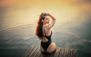 Woman black swimsuit dock sunset - a black swimsuit free wallpaper