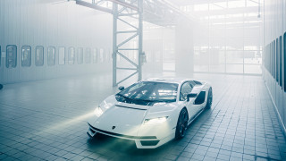 White sports car large building - a white sports car free wallpaper