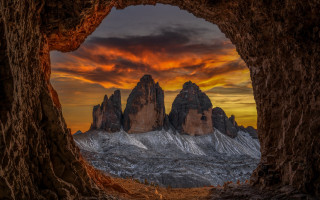 Mountain range cave sunset red - a view of a mountain range free wallpaper
