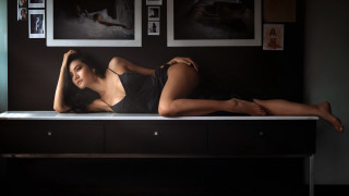 Woman laying table art photography - a table in a room free wallpaper