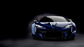 Blue sports car dark room 6 - a black background and a spotlight free wallpaper