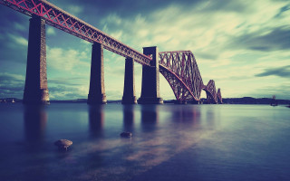 Bridge water sky clouds rocks 2 - the water below free wallpaper