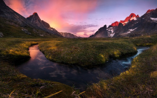 Lush green valley sunset mountains - a stream free wallpaper