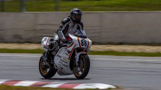 Man motorcycle race track helmet 2 - a motorcycle free wallpaper