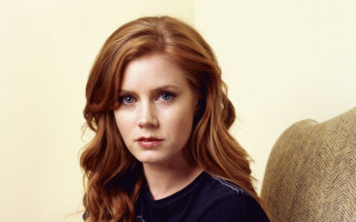 Red hair woman couch remote - a remote control free wallpaper