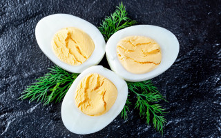Hardboiledeggs dill blackbackground food photography - a black surface free wallpaper