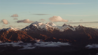 Mountain range clouds city sunset - a mountain range free wallpaper