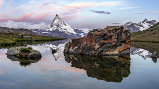 Mountain lake rock sky ocean - a pink sky free wallpaper