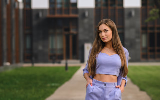 Woman casual cosplay portrait outdoors - a building free wallpaper