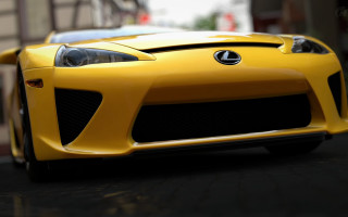 Yellow sports car street building 3 - a yellow sports car free wallpaper