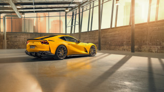 Yellow sports car garage city - side profile free wallpaper