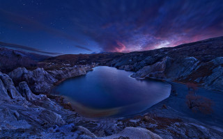 Lake rocks night star mountain - a mountain range in the background free wallpaper